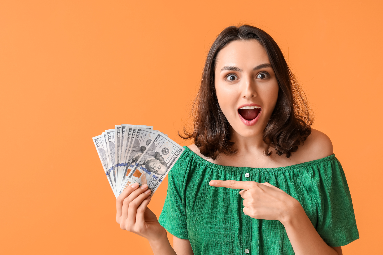 A girl holding money